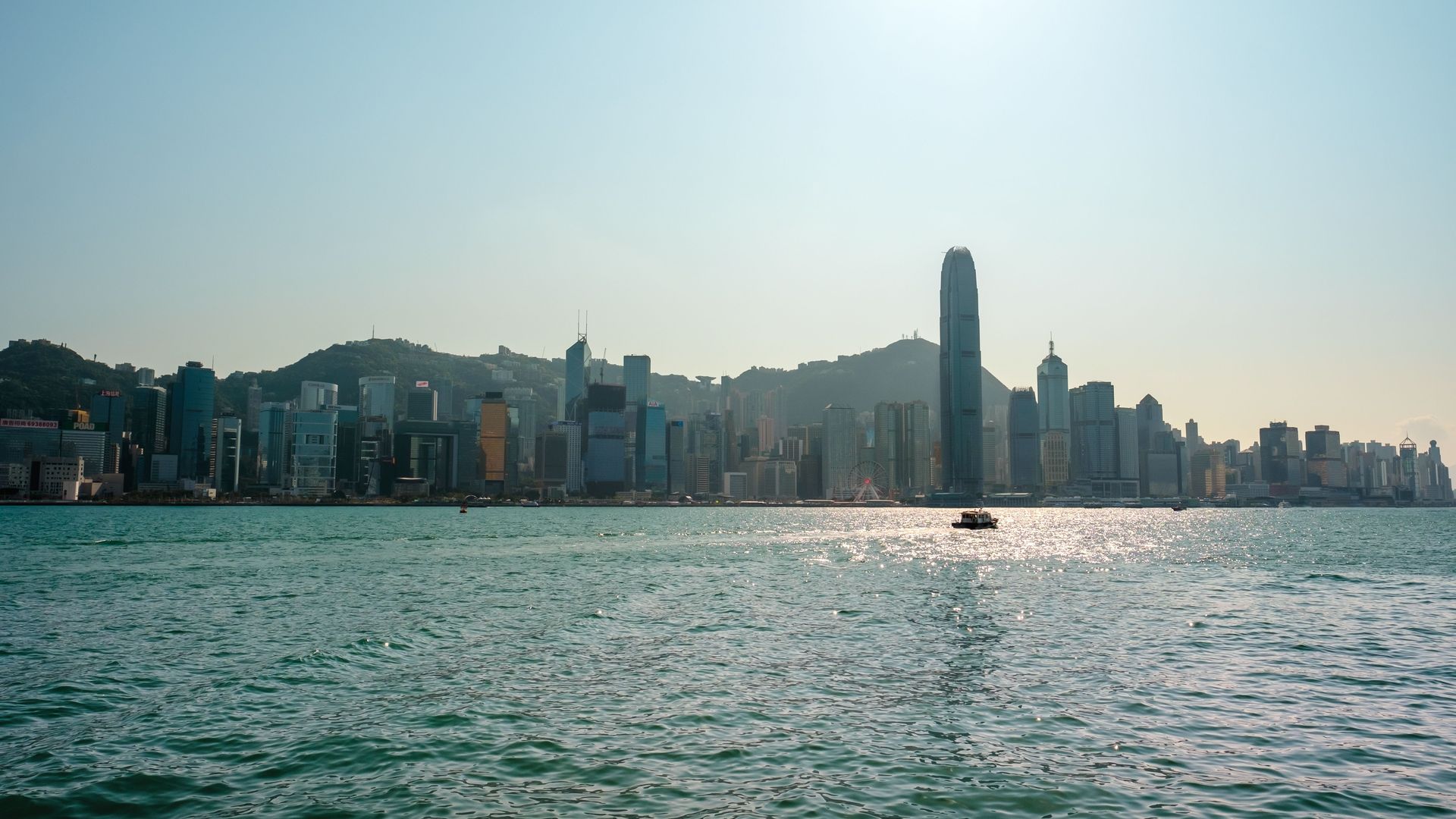 Hong Kong skyline at dusk over Victoria Harbour