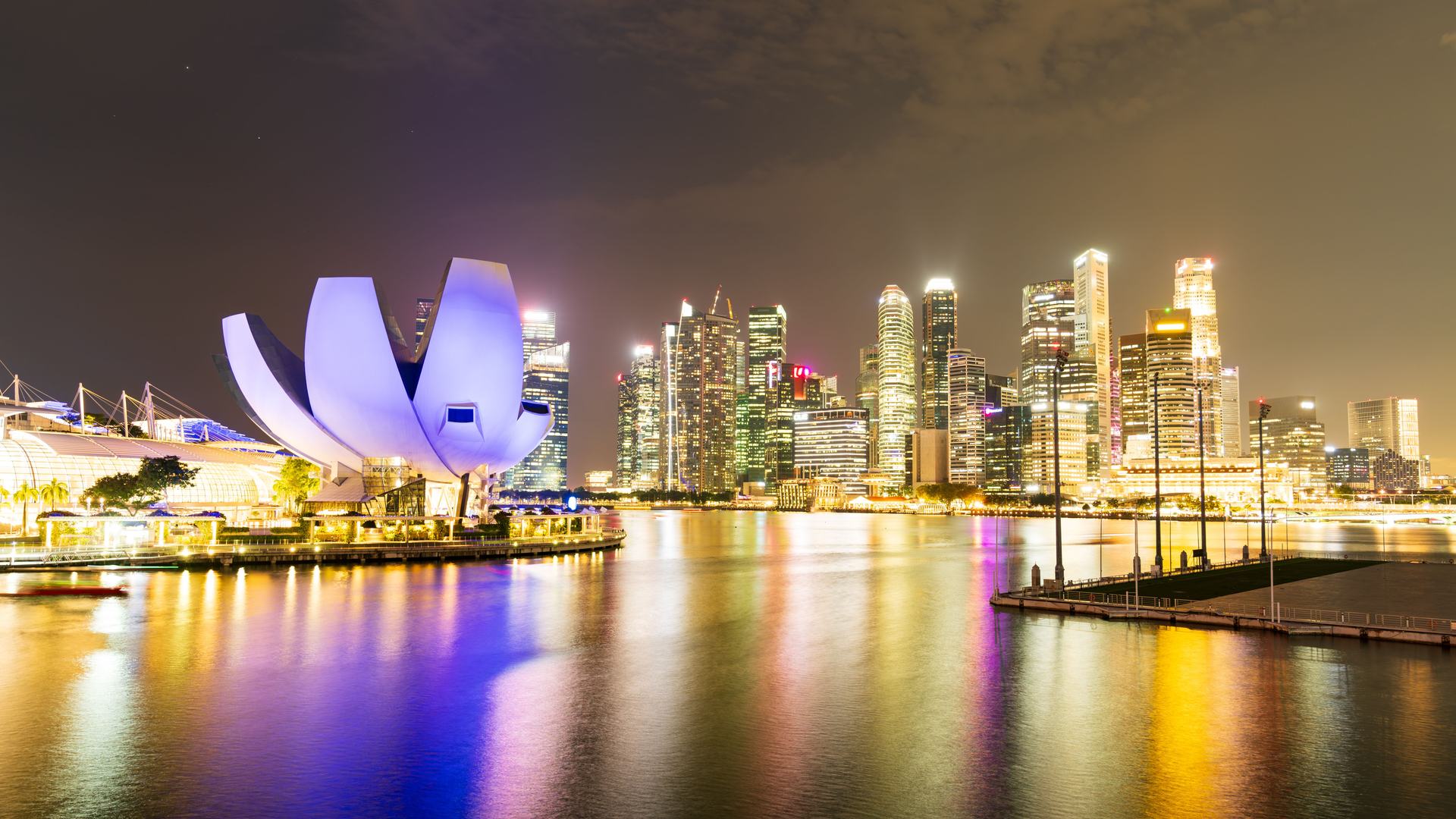 Singapore skyline at dusk over Marina Bay